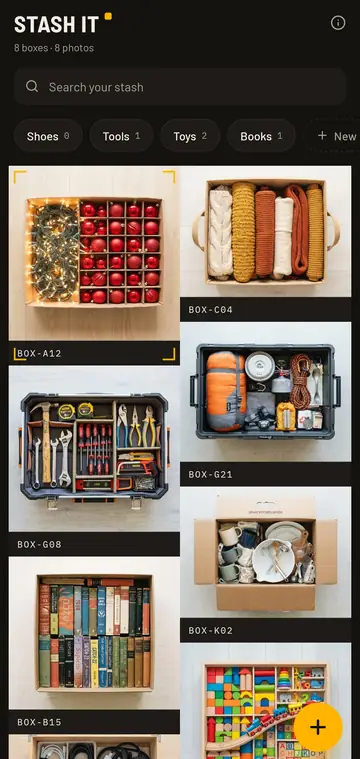 The home screen: a wall of contents photos, each captioned with its box code, over a dark background.